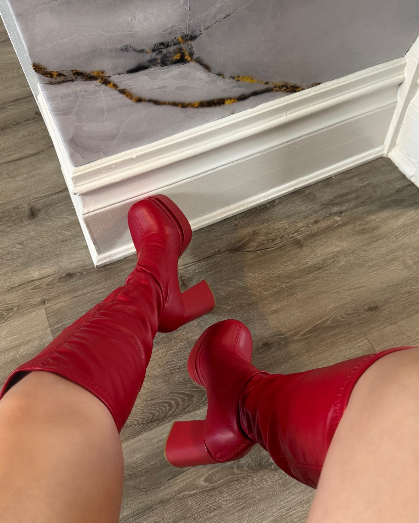 Red leather high boots