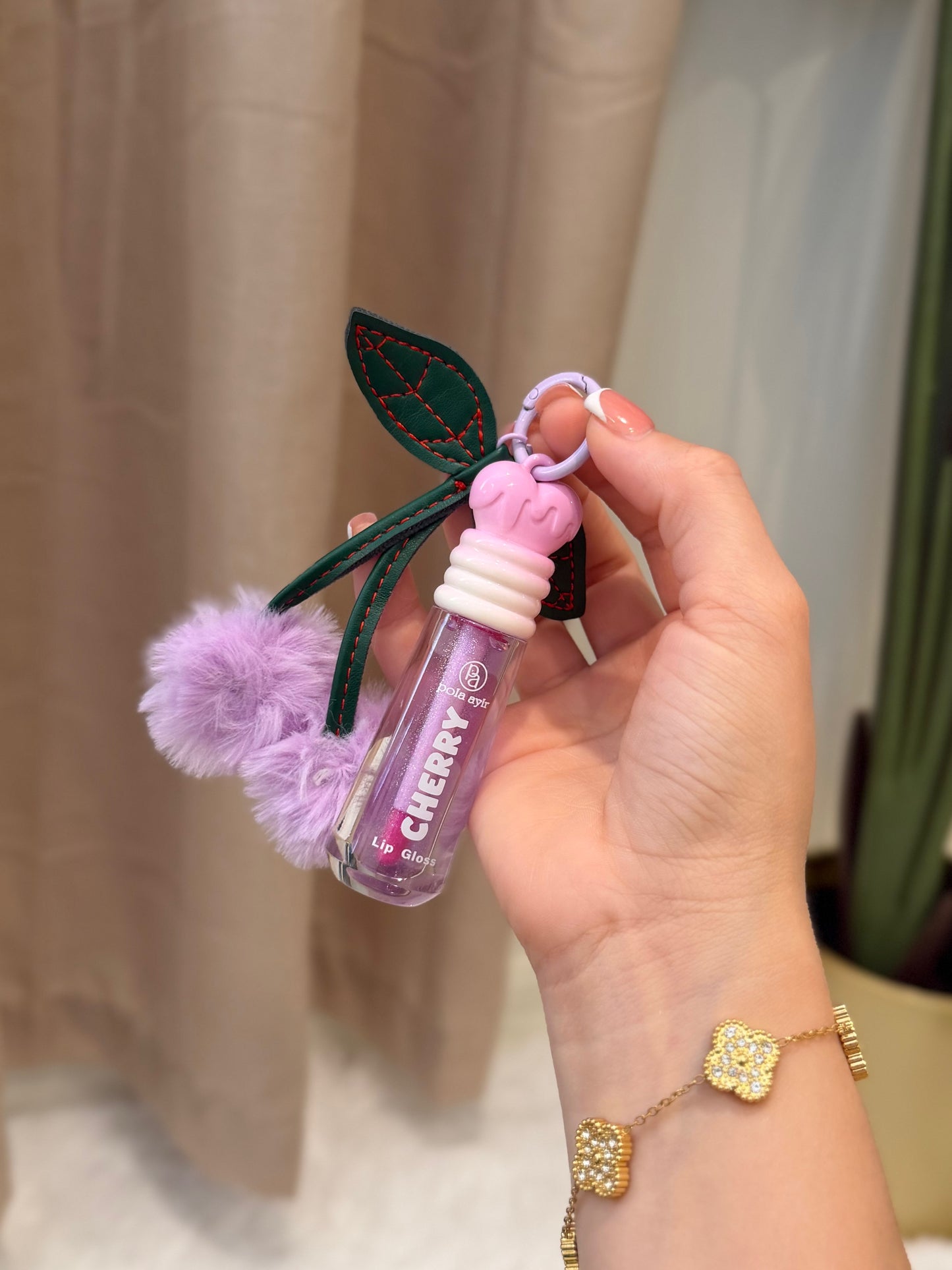 Cherry chain lip gloss