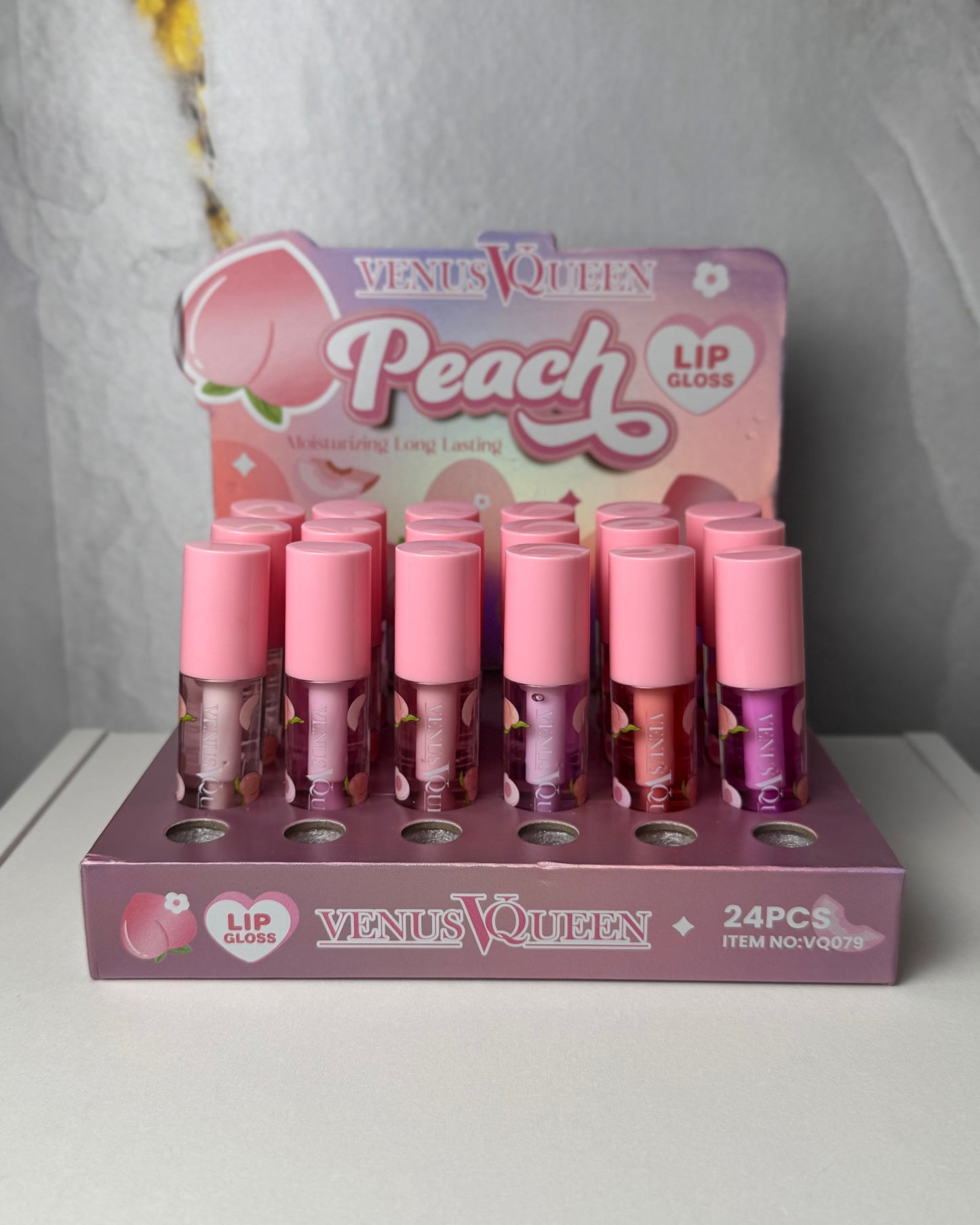 Peach scented lip gloss