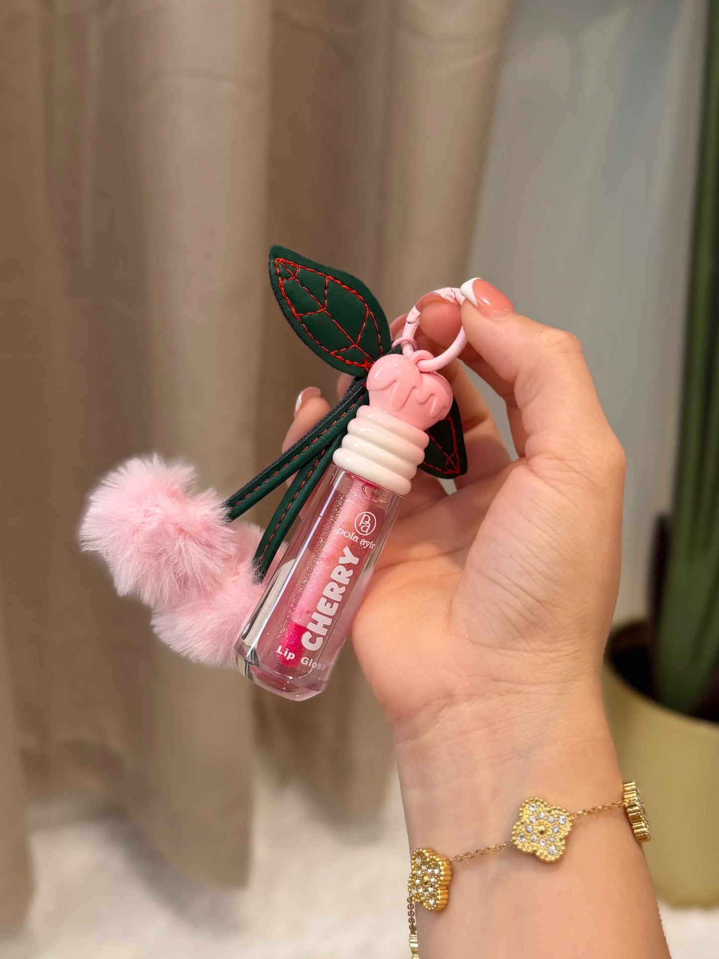 Cherry chain lip gloss